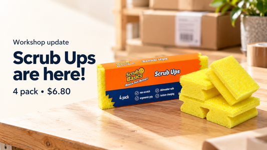 Scrub Ups four-pack and yellow sponges on a workshop bench — four for $6.80
